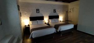 Ένα ή περισσότερα κρεβάτια σε δωμάτιο στο APARMENT SAMANA HOUSE AREQUIPA
