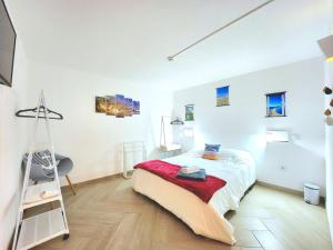 Кровать или кровати в номере Quartos para viajantes, surfistas, grupos, Boa Energia