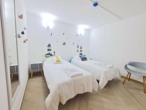 Postel nebo postele na pokoji v ubytování Quartos para viajantes, surfistas, grupos, Boa Energia