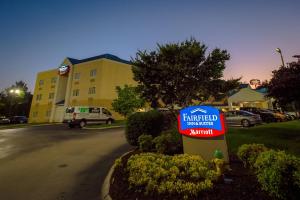 a sign for a hotel in front of a building at Fairfield Inn & Suites by Marriott Knoxville/East in Knoxville