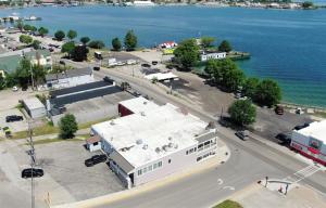 an aerial view of a building next to the water at Pier Harbor #2 in Saint Ignace