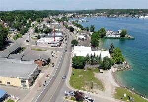 an aerial view of a town next to a body of water at Pier Harbor #1 & #2 in Saint Ignace