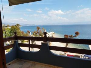 a view of the beach from the balcony of a house at Vrachos Κanari in Kiveri