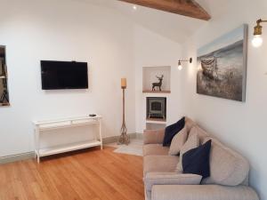 Zona d'estar a The New Forest Manor Apartment