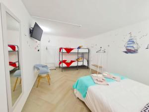 Postel nebo postele na pokoji v ubytování Quartos para viajantes, surfistas, grupos, Boa Energia