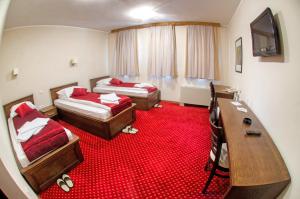 Postel nebo postele na pokoji v ubytování Hotel Konak Konjic
