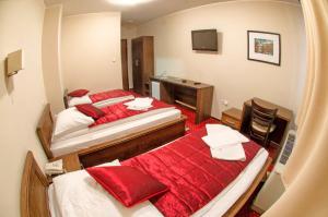 Postel nebo postele na pokoji v ubytování Hotel Konak Konjic