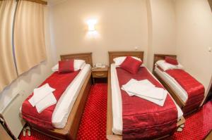 Postel nebo postele na pokoji v ubytování Hotel Konak Konjic