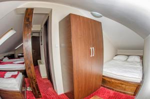 Postel nebo postele na pokoji v ubytování Hotel Konak Konjic