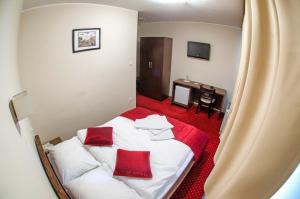 Postel nebo postele na pokoji v ubytování Hotel Konak Konjic