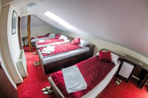 Postel nebo postele na pokoji v ubytování Hotel Konak Konjic