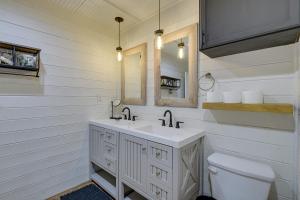a bathroom with a sink and a toilet at Dog-Friendly Home with Yard and Fire Pit in Midlothian in Midlothian +24 photos