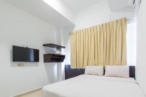 Postel nebo postele na pokoji v ubytování Hollitel Hotel
