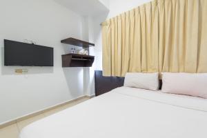 Postel nebo postele na pokoji v ubytování Hollitel Hotel