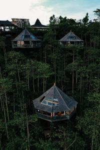 an aerial view of a house in the forest at Munduk Heaven Luxury Villas in Munduk