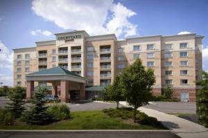 une représentation de l'avant d'un hôtel dans l'établissement Courtyard by Marriott Toronto Vaughan, à Vaughan