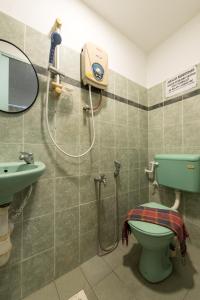 Koupelna v ubytování Hollitel Hotel