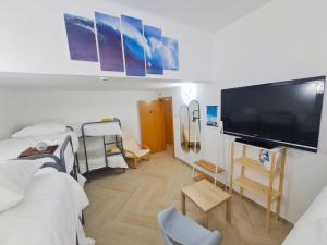 Postel nebo postele na pokoji v ubytování Quartos para viajantes, surfistas, grupos, Boa Energia