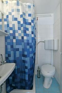 Koupelna v ubytování Delfini Hotel