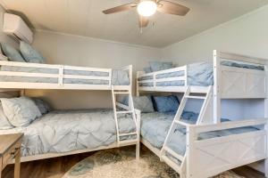 a room with three bunk beds and a desk at Pittsburg Vacation Rental Less Than 1 Mi to Boat Launch in Galmey