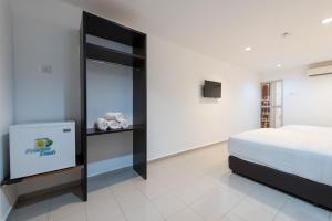 Postel nebo postele na pokoji v ubytování Hollitel Hotel