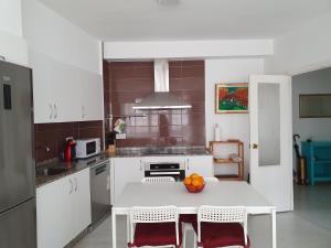 Kuchyň nebo kuchyňský kout v ubytování El piso de Valle-Inclán