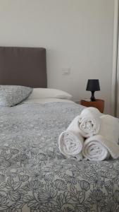Postel nebo postele na pokoji v ubytování APARTAMENTO TURÍSTICO CARBONERAS + 25 fotografií
