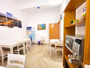 Kuchyň nebo kuchyňský kout v ubytování Quartos para viajantes, surfistas, grupos, Boa Energia