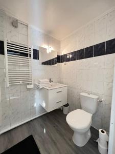 Łazienka w obiekcie AptCityStay