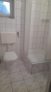 Kúpeľňa v ubytovaní Tumska Przystań