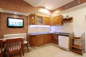 Kuchyňa alebo kuchynka v ubytovaní Carla Studio Apartment