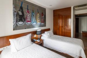 Postel nebo postele na pokoji v ubytování Hotel A.S. Sao Joao da Madeira