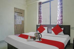 Postel nebo postele na pokoji v ubytování Hotel O R K Exclusive