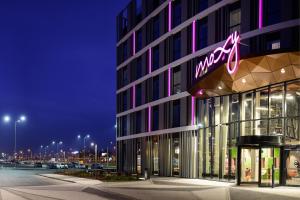 a rendering of a msg building at night at Moxy Poznań Airport in Poznań