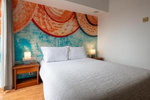 Postel nebo postele na pokoji v ubytování Hotel A.S. Sao Joao da Madeira