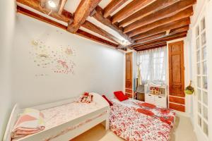 Fotografia z galérie ubytovania Notre-Dame Appartement Familial v Paríži
