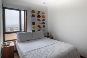 Postel nebo postele na pokoji v ubytování Hotel A.S. Sao Joao da Madeira