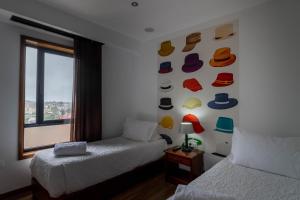 Postel nebo postele na pokoji v ubytování Hotel A.S. Sao Joao da Madeira