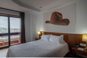 Postel nebo postele na pokoji v ubytování Hotel A.S. Sao Joao da Madeira