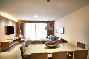 TV a/nebo společenská místnost v ubytování Sheraton Santos Hotel