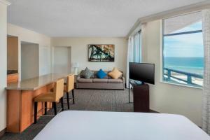 a hotel room with a view of the ocean at Residence Inn Fort Lauderdale Pompano Beach/Oceanfront in Pompano Beach