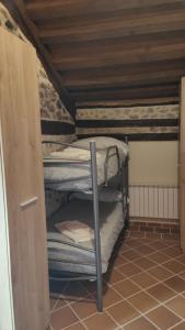 A bed or beds in a room at La canongia