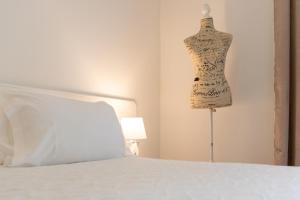 Postel nebo postele na pokoji v ubytování Hotel A.S. Sao Joao da Madeira