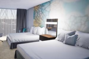 Katil atau katil-katil dalam bilik di Courtyard by Marriott Tuxpan Veracruz