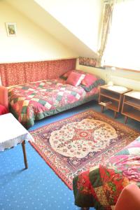 Posteľ alebo postele v izbe v ubytovaní Pensjonat B&B Nad Rudawą