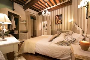 Säng eller sängar i ett rum på San Michele al Borgo