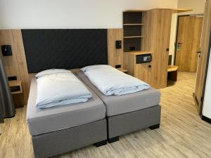 Krevet ili kreveti u jedinici u objektu Meerzeit Strandhotel
