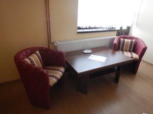 A seating area at Konsky Dvor