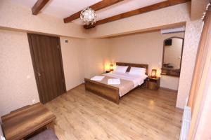 Postel nebo postele na pokoji v ubytování Hotel Traveler