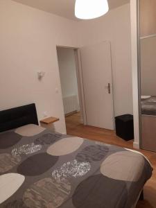 Posteľ alebo postele v izbe v ubytovaní Logement entier - Appartement
